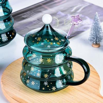 China Sustainable Creativity Borosilicate Glass Coffee Mug Christmas With Lid And Spoon Mug Christmas for sale