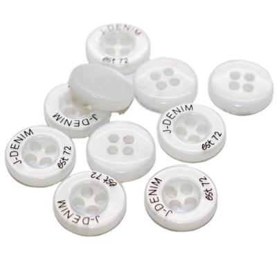 China Brand Fancy Shirt Buttons Washable Custom Laser Engraved Logo Plastic Buttons for sale