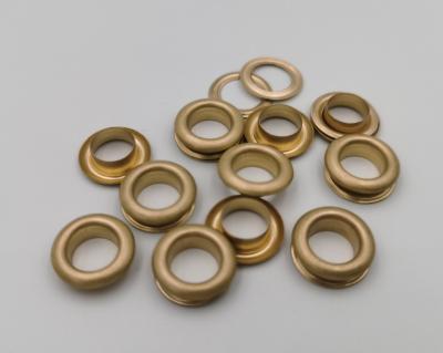 China Custom Brass Colored Clothing 12mm Round Nickel Free Grommets Gold Grommets For Boots for sale