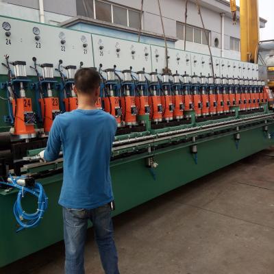 China Automatic 24 Heads Automatic Slope Pads And Soil Stabilization Metal Geogrid Ultrasonic Welding Machine for sale