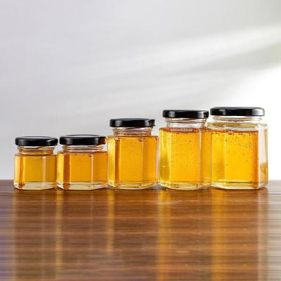 China Custom Color Glass Hexagonal Jar For Cream Honey 45ml 180ml 500ml 700ml for sale