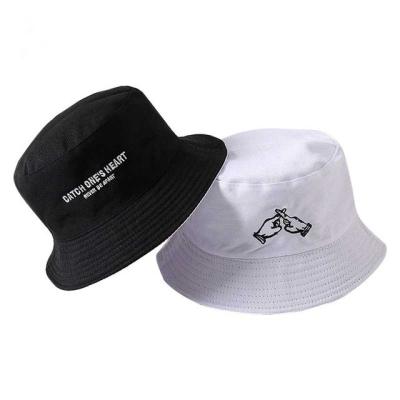 China Reversible Picture Brim Cotton Bucket Hat Embroidery Beach Hat for sale