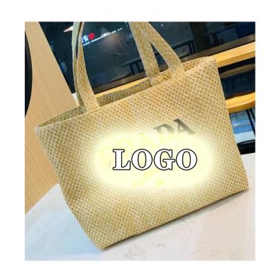 China Fashion Custom Large Capacity Straw Bucket Bag Woven Handbag Women Basket Beach Bag for sale