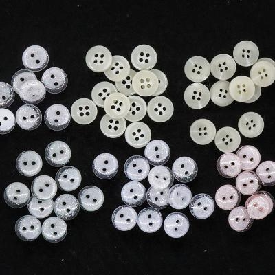 China Viable Custom Shiny Plastic Resin Four-hole Round Logo Buttons Shirt Button for sale