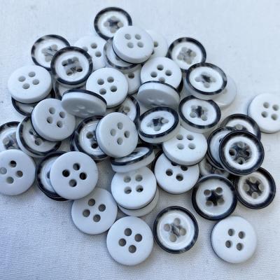 China Viable Custom Logo 4 Holes Clothes Buttons Sewing Shirts Buttons Are Used For Shirts for sale