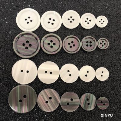 China Viable Color Imitation Thin Edge Seven Button Coat Shell Flat Sales Inventory Double Plastic Shirt Button for sale