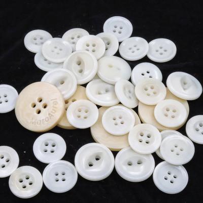 China Custom 2 hole 4 hole fruit nut free washable wholesale button natural corozo nickel corozo button for shirt for sale