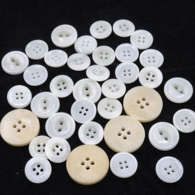 China Wholesale nickel viable freewashable button maker custom laser engraved pattern 4 hole corozo white natural shirt buttons for sale