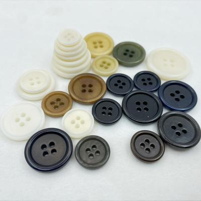 China Viable Nickel Button Manufacturer Wholesale Custom Freewashable Laser Engraved Pattern 4 Hole Color Corozo White Natural Shirt Buttons for sale