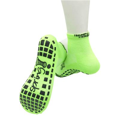 China OEM Anti Slip Trampoline Bounce Park Feet Football Athletic Socks Grab Low Cut Sports To Trample Sports Socks for sale