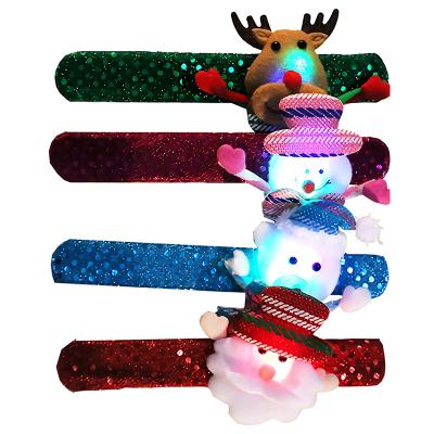 China Christmas/Thanksgiving/Halloween Light Up Christmas Slap Bracelet Led Plush Toy Santa Claus Elk Cartoon Clap Hands Ring Party Decoration Children Creative Gift for sale