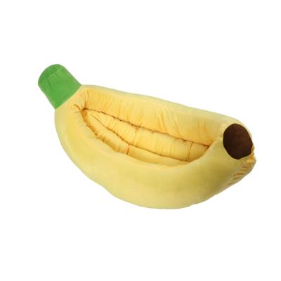 China Travel PolypropylPlush Boat Dog Bed Ne Cotton Banana Shape Soothing Soft Dog Cat Bed for sale