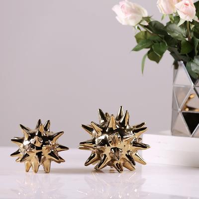 China Abstract Modern Home Decorations Plated Spiky Ceramic Ball Sea Urchin Gold Ornaments For Table Decor for sale