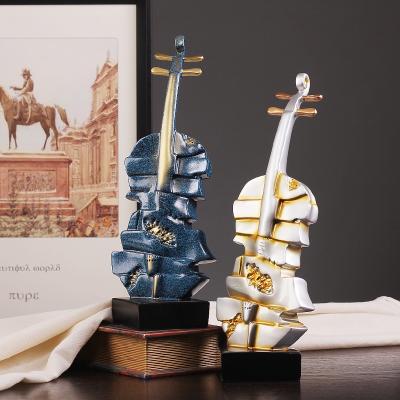 China Creative Modern Office Decoration Resin Musica Violin Home Living Room Opens Model Ornament for sale