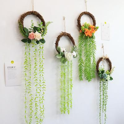 China Central Institute of Statistics modern Nordic creative flower decoration wall rattan green plant simulation hanging hanging for sale