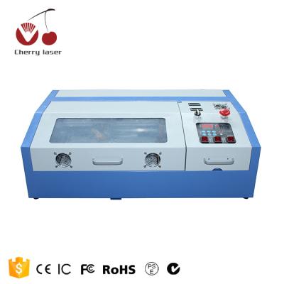 China Laser Engraving High Cost Performance Big Features 3020 Mini Laser Engraving Machine For MDF Wood DIY Acrylic for sale