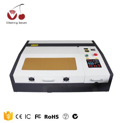 China Laser Engraving Acrylic Wood Paper Mini Laser Engraving Machine High Quality 4040 China CNC Rubber Stamp Machine for sale