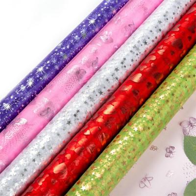 China Shrink-Resistant Home Christmas Decorations Organza Fabric With Cheap Price Stock Fabric for sale