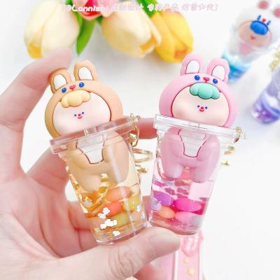 China Creative Promotion Gift Rabbit Milk Tea Small In Oil Pendant Key Chain Liquid Cute Quicksand Floating Colorful Stone Girl Car Keychain Bag Gift for sale