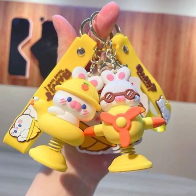 China Promotion Gift Trojan Rocking Music Doll Key Chain Trojan Rocking Doll Key Chain Creative Cute Fashion Car Student Bag Pendant for sale