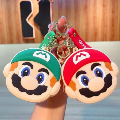 China Cute Promotion Gift Silica Gel Earphone Storage Bag Cartoon Mario Bros Coin Purse Girls Wallet Bags With Hand Strap Key Chain for sale