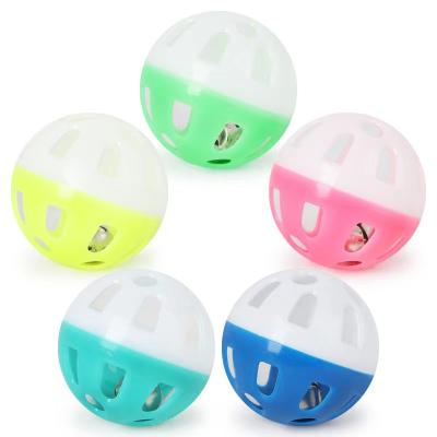 China Plastic Pet Stocked Ball Toy Small Bell Balls Cat Toy Hollow Out Cat Toys For Kitten for sale