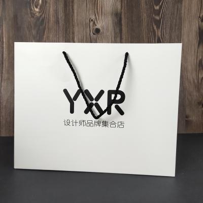 China Recyclable Custom Printed Paper Bags Clothes Store Retail Packaging Gift Carry Bags Boutique Shopping Paper Bags With Your Own Logo for sale