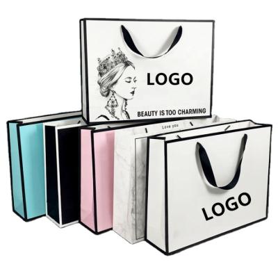 China Recyclable wholesale custom boutique logo printing art OEM shopping bags white clothing shoes packaging paper bags with handle for sale