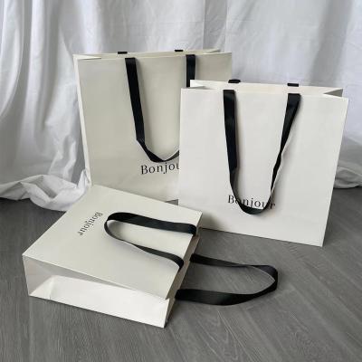 China Recyclable Custom Logo Printed Jewelry Paper Gift Bag Boutique Luxury Small Paper Bag For Jewelry Shopping Packaging With Ribbon Handle for sale