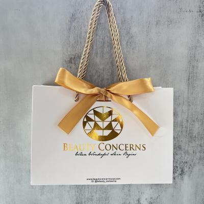 China Gold Recyclable Custom Logo Hot Sale Gift Paper Bag Luxury Small Wedding Gift Packaging Paper Bag With Logo Jewelry Shopping Gift Paper Bag for sale