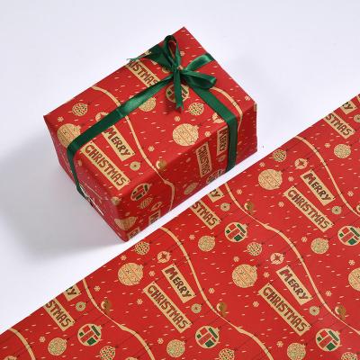 China Manufacturer Price Recycled Merry Christmas Kid Baby Gift Hot Stamping Rolling Kraft Wrapping Paper for sale