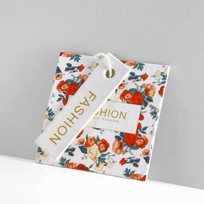 China Recyclable High Quality Paper Name Logo Garment Hangtag Label Clothing Hang Tag Clothes Printing Hang Tags Luxury Custom Design for sale