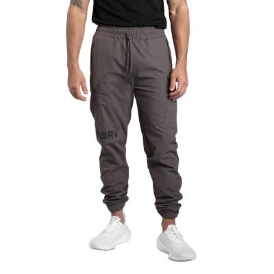 China High Quality Custom Logo Men's Fashion Casual Pants Anti-Wrinkle Loose Pants Slim Men's Sweatpants Waist Trousers for sale