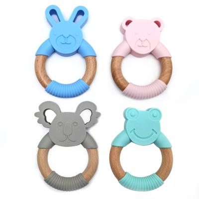 China Best Selling Eco-Friendly Bpa Amazon Free Round Silicone Baby Rabbit Wooden Teether for sale