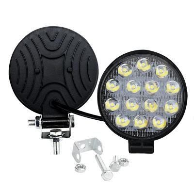 China /Normal Light Flashing Round Shape 14 Beams LED Spot Working Light Trucks 42W Auto Off Road Led Work Car Motorcycle Light for sale