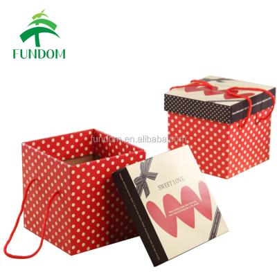 China Wholesale Red Square Fancy Cute Fancy Luxury Party Dot Printing Wedding Favor Corrugated Paper Party Bulk Alibaba Recyclable China Gift Box With Handle for sale