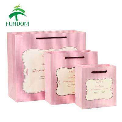 China Recyclable Wholesale Universal Blue And Pink Stripe Design Favor Gift Paper Bag for sale