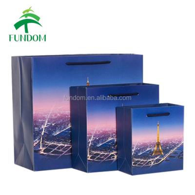 China Wholesale High Quality Luxury Recyclable Custom Order Gift Wrapping Paper Eiffel Tower Printed Shopping Bag With Matte Lamination for sale