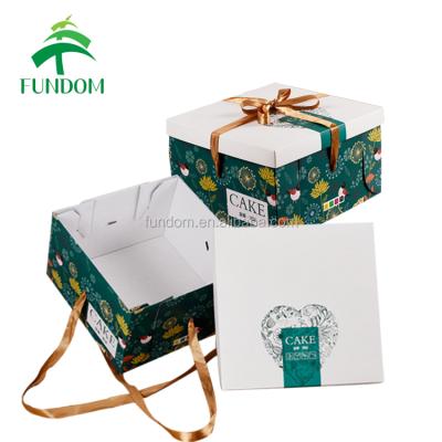 China Recyclable Chinese Supplier Custom Wedding Gift Cake Folding Paper Box Big With Ribbon Handle for sale