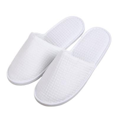 China Customized Reusable White Disposable Cotton Waffle Factory Direct Plain Cotton Waffle Hotel Slippers for Women and Men for sale