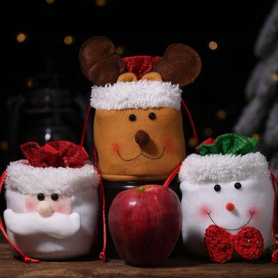 China Apple Candy Drawstring Christmas Gift Bag Kids Hotel and Resort Gifts Merry Christmas Promotional Reusable Santa Claus and Milu Decoration Deer for sale