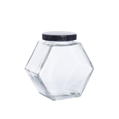 China Wholesale Hexagonal Glass Honey Container Honey Storage Bottle Glass Honey Jar with Matel Lid for sale