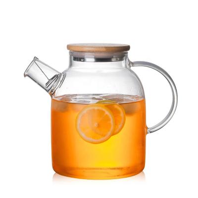 China WITH LID Borosilicate Lager Volume Elegant Glass Teapot with bamboo lid for sale