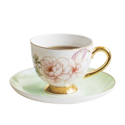 China Contemporary Wholesale Ceramic Tea Cup and Saucer With Rim Elegant Country Style Coffee Cup Gold Bone China For Hotels for sale