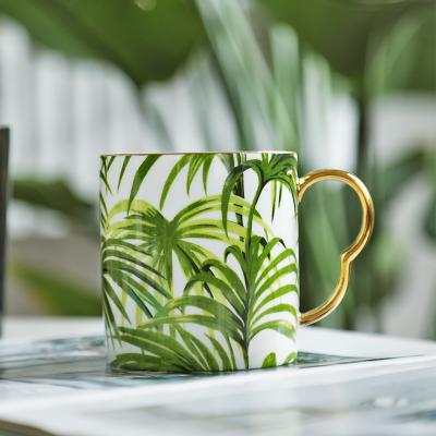 China Viable Design Modern Lush Bone China Ceramic Tea Cups Palm Coffee Mugs With Gold Rim for sale