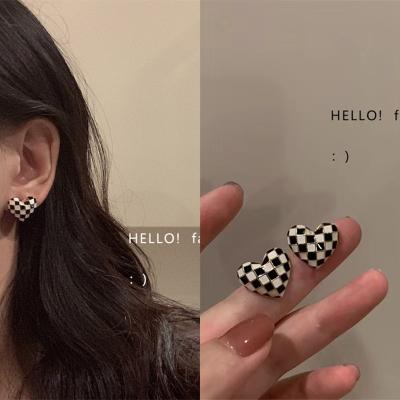 China Hyperbole South Korea East Gate S925 Silver And Minority Design Lattice Winter Love New Fashion Soft Earrings for sale