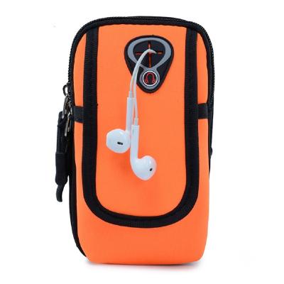 China Waterproof Waterproof Mobile Phone Arm Running Bag With Earphone Hole Sports Fitness Equipment Wrist Bag for sale