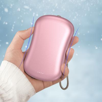 China 4-8h Heat Settings 2 Hand Warmers Rechargeable Electric Hand Warmer Power Bank With 10000mAh Battery for sale