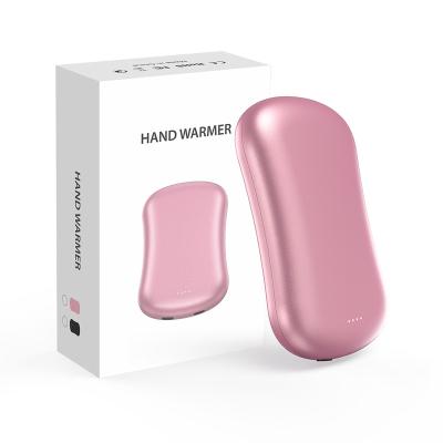 China 4-8h Vibration Massage Office Use Hand Warmers 2022 Power Bank 10000mAh Pocket Pocket Hand Heater for sale