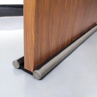 China Modern Wholesale Manufacture Foam Dust Plug Under Door Bottom Seal Strip Stopper Door And Window Breeze Stopper for sale